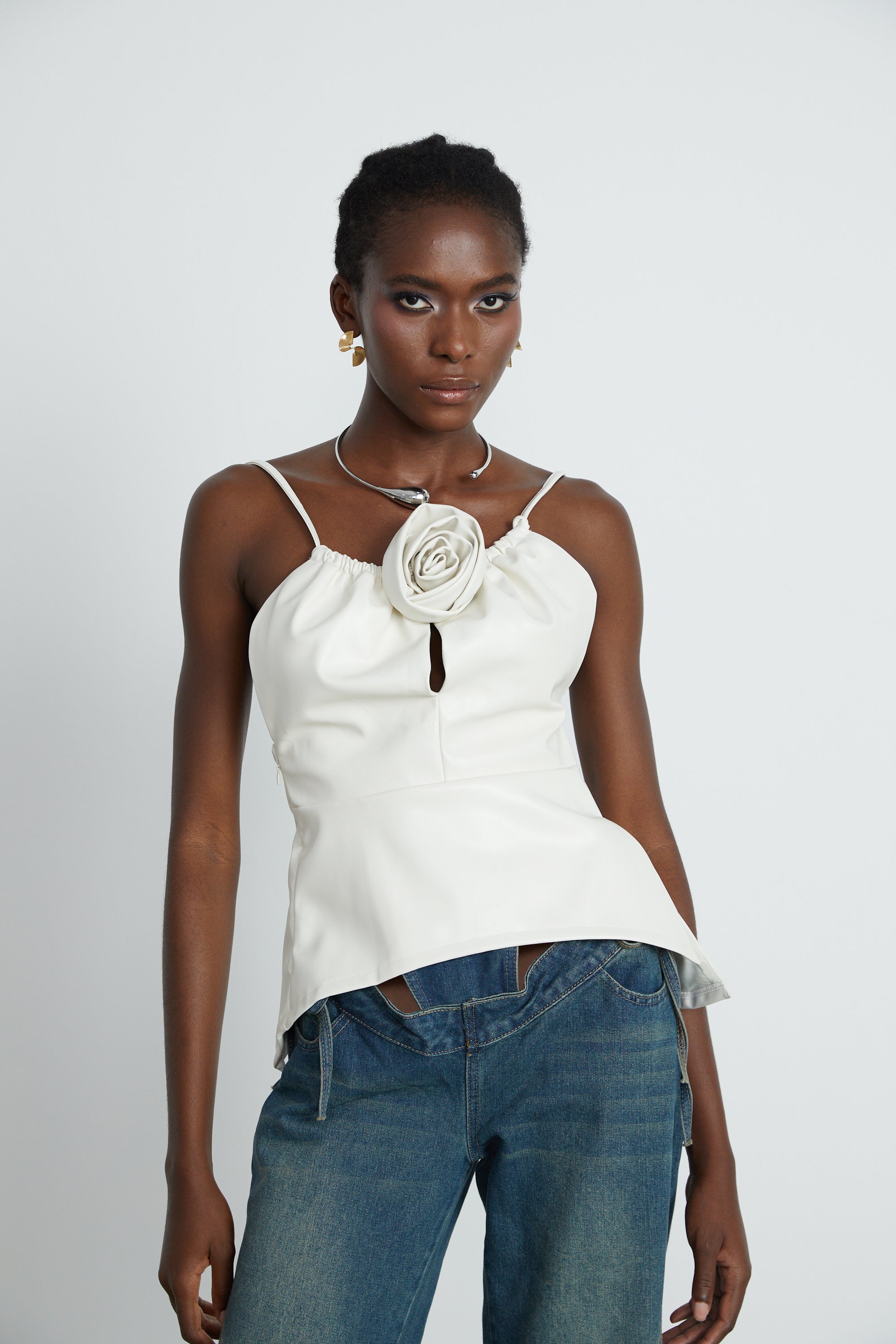 Sancia floral-appliqué leather top