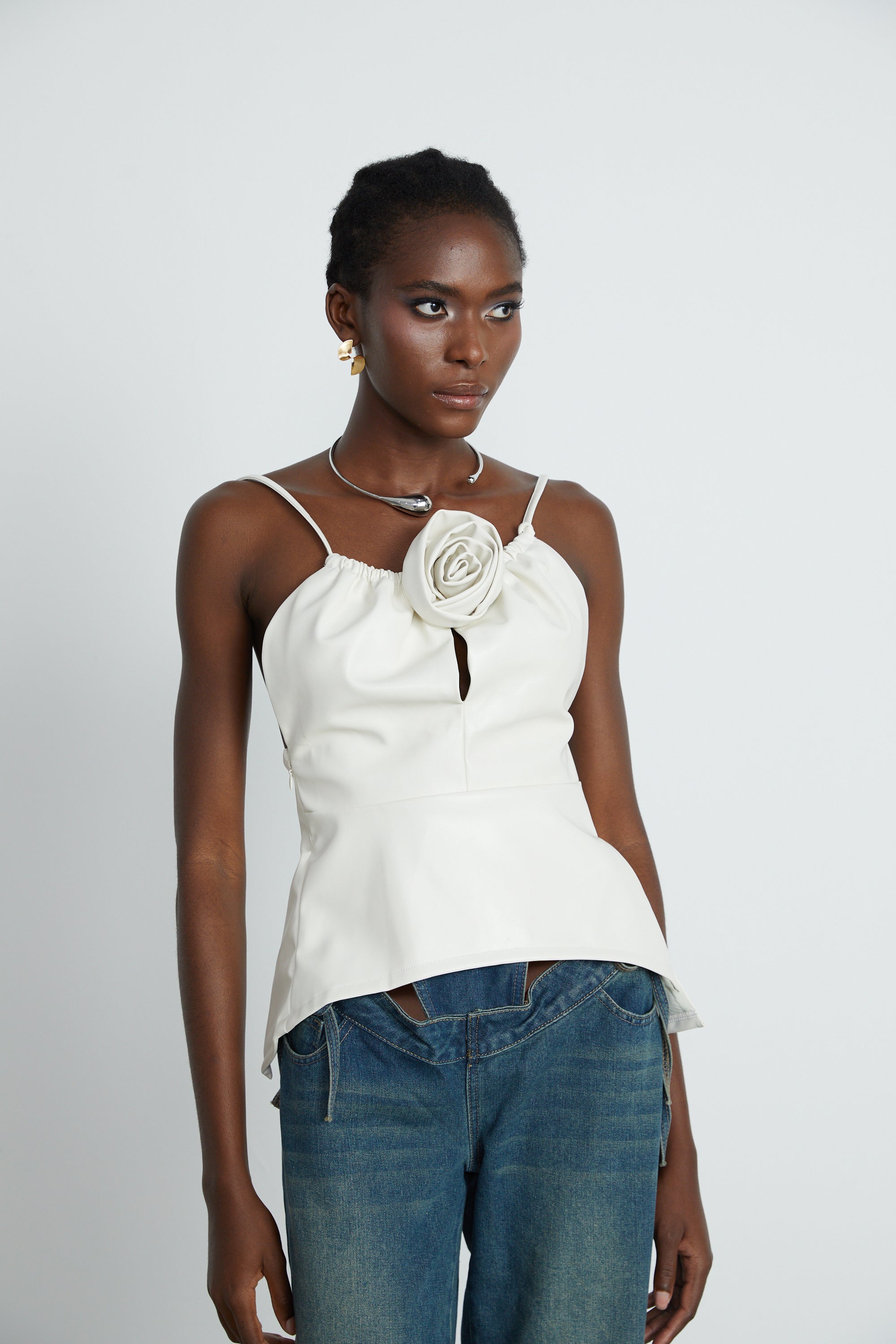 Sancia floral-appliqué leather top