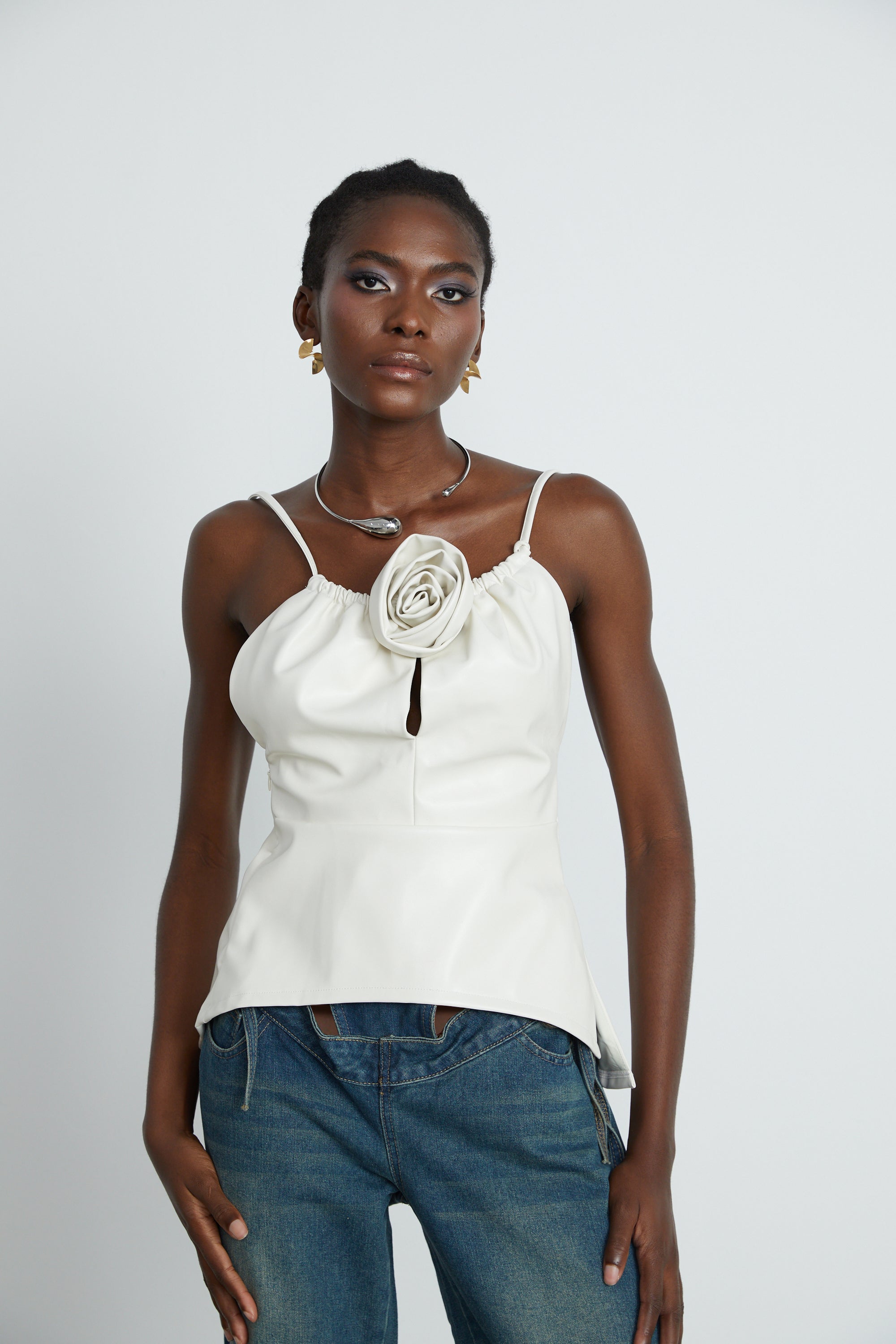 Sancia floral-appliqué leather top