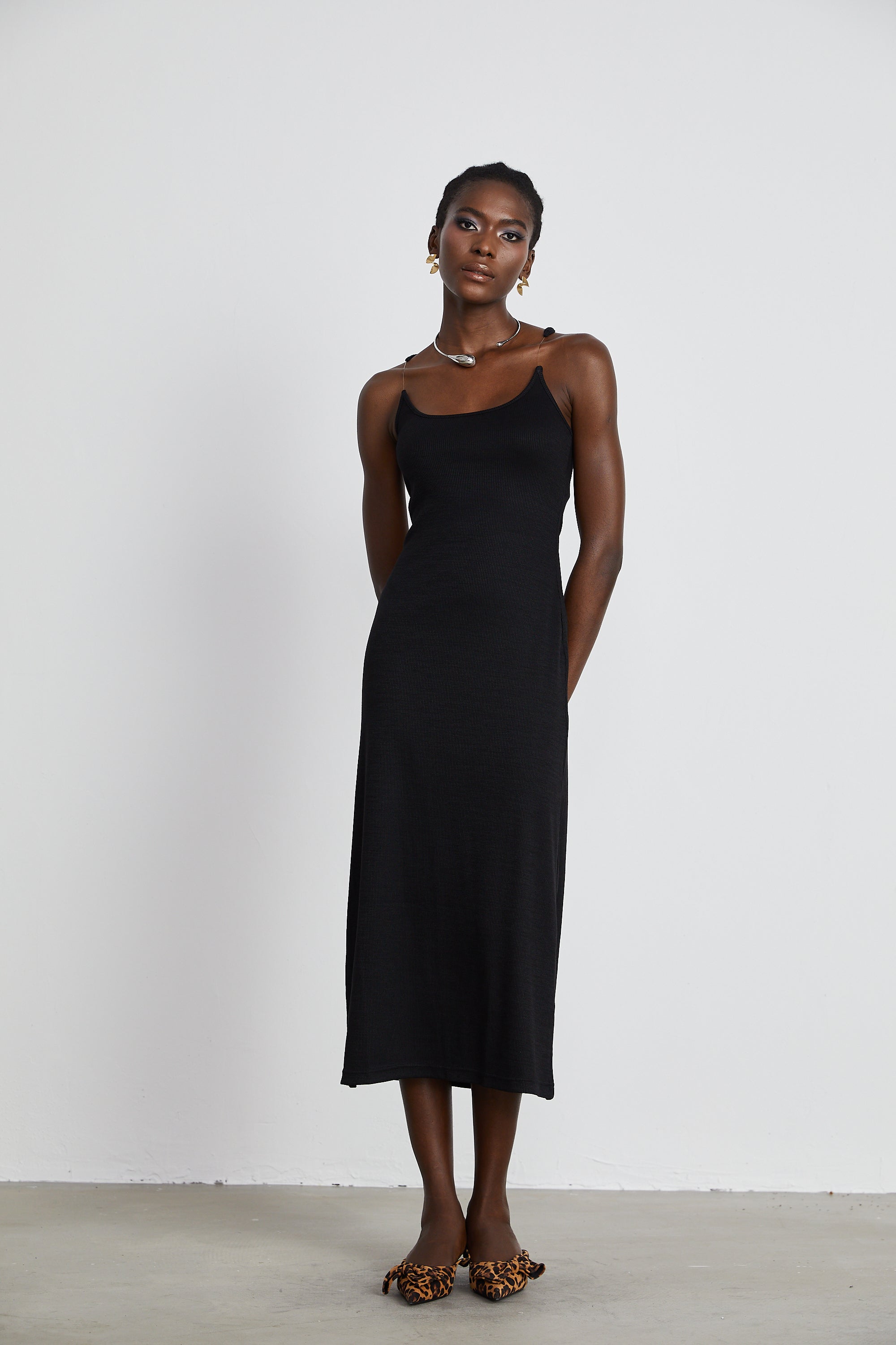 Madeleine invisible-strap ribbed maxi dress