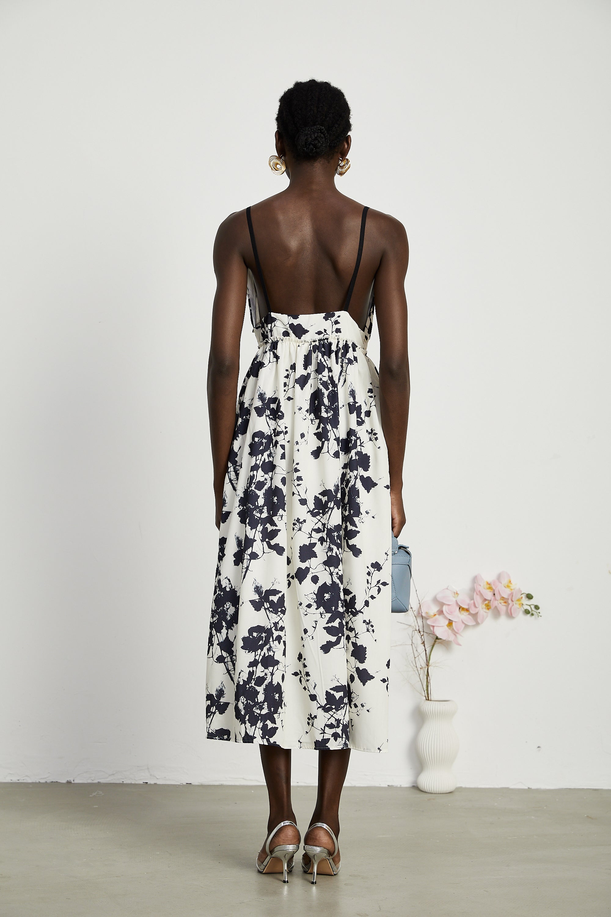 Persephone pleated floral-print midi dress