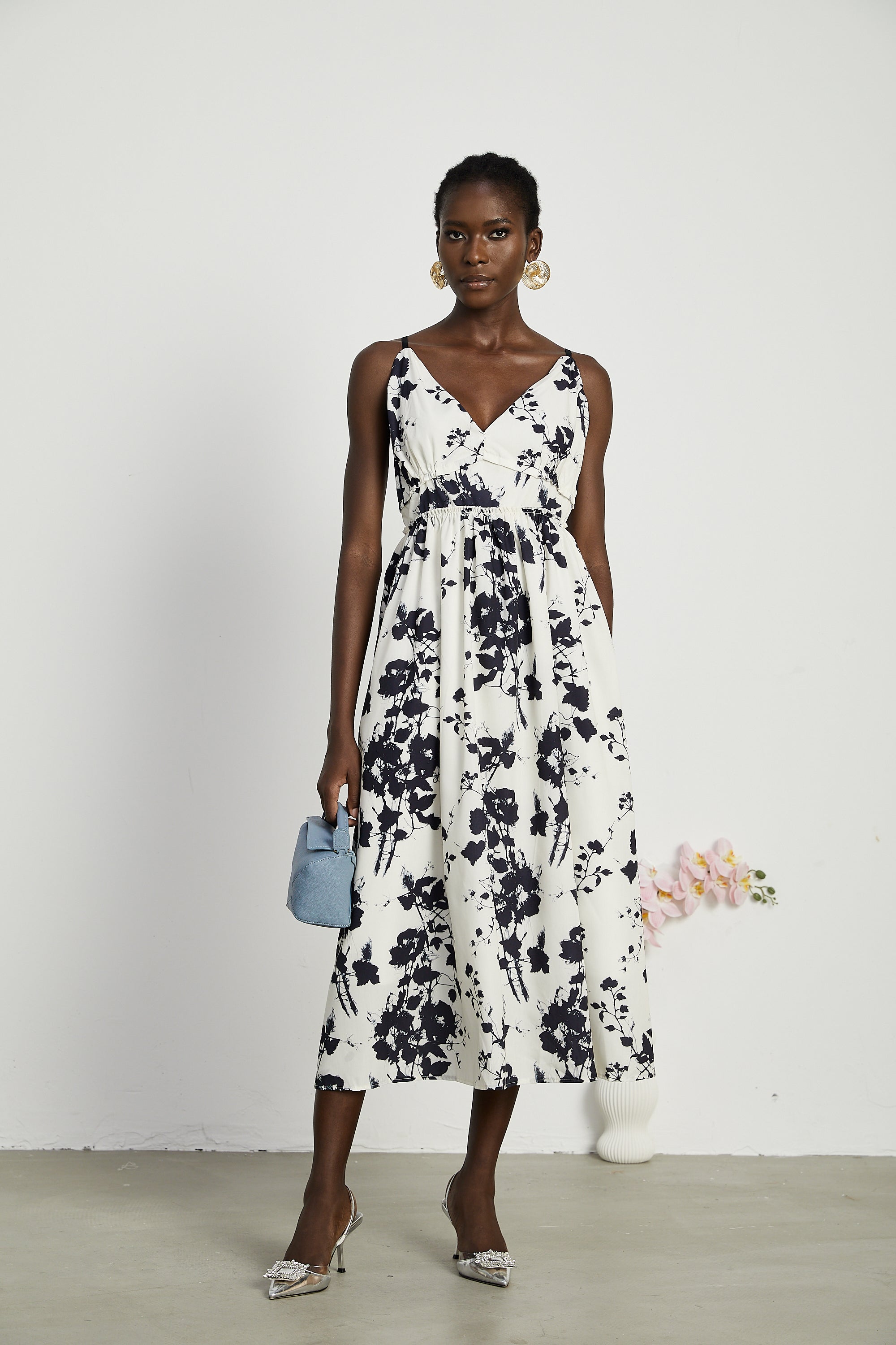 Persephone pleated floral-print midi dress